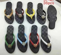 six pairs of flip flops in different colors