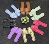 a group of different colored sandals in a circle